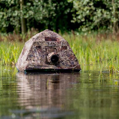Buteo Fotosausrüstung drijfent schwimmend verstecken grebe