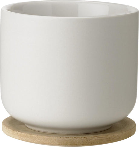 Stelton Theo Becher mit Untersetzer – Sand