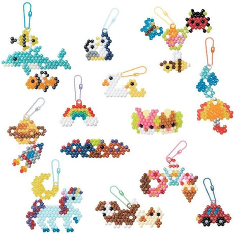 Aquabeads 35025 – mein Schlüsselanhänger und Anhänger Komplettset – Perlen, die am Wasser haften