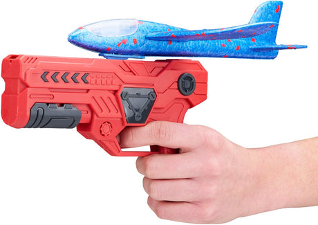 Eddy Toys Segelflugzeugpistole 2-in-1 – Pistole mit Segelflugzeug – Spielzeugwerfer mit Segelflugzeug – Spielzeugflugzeug mit Startpistole – 1 zufällige Farbe