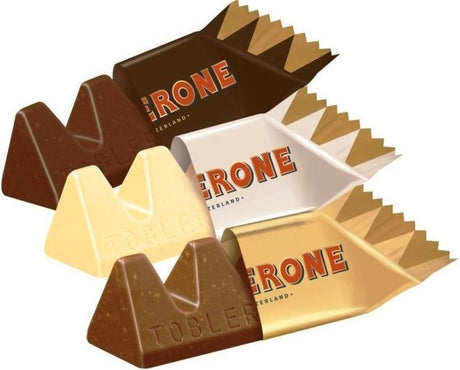 Toblerone tiny variety melk, wit, puur chocolade assortiment 248g - kerstcadeau - chocoladecadeau - chocoladesnoepjes - chocolade voor bij de koffie - verjaardag cadeau vrouw of man - geschenkset voor man en vrouw