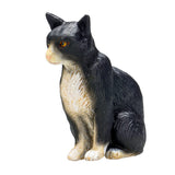 Mojo Farmland sitzende Katze schwarz und weiß – 387371