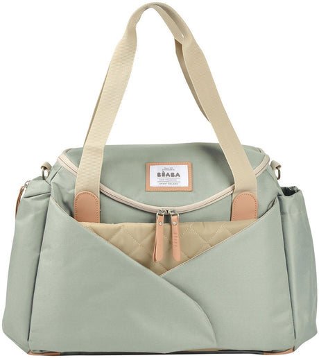 Béaba Sydney Wickeltasche – Stilltasche mit ausklappbarer Kokon-Wickelfläche – herausnehmbare Wickelunterlage – isotherme Seitentasche für Fläschchen – wasserdichter Beutel für schmutzige Wäsche – Kinderwagenbefestigung – Salbeigrün