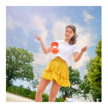 Engelhart diabolo van rubber met metalen stokjes - fluor rood