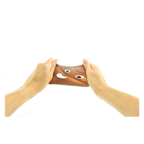 Toi-toys lustiger, klebriger, dehnbarer, lachender Kot