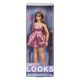 Mattel Barbie sieht Modepuppe mit rosa Kleidung aus