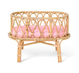Puppenwiege aus Rattan mit rosa Matratze