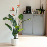 Smaragdkunstpflanze mit Topf und Blumen Strelitzia 120 cm