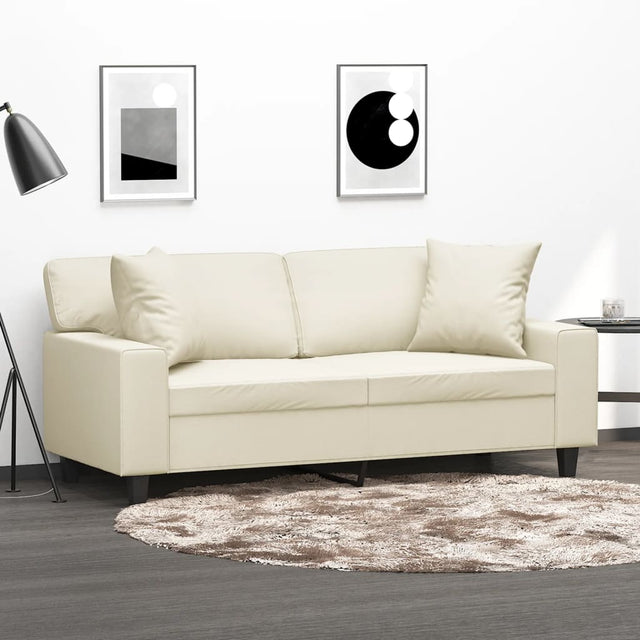 Vidaxl tweezitsbank met sierkussens 140 cm kunstleer crèmekleurig
