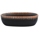 Vidaxx Aufsatzwaschbecken oval 47x33x13 cm Keramik schwarz und orange