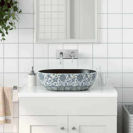 Vidaxx Aufsatzwaschbecken oval 47x33x13 cm Keramik schwarz und blau