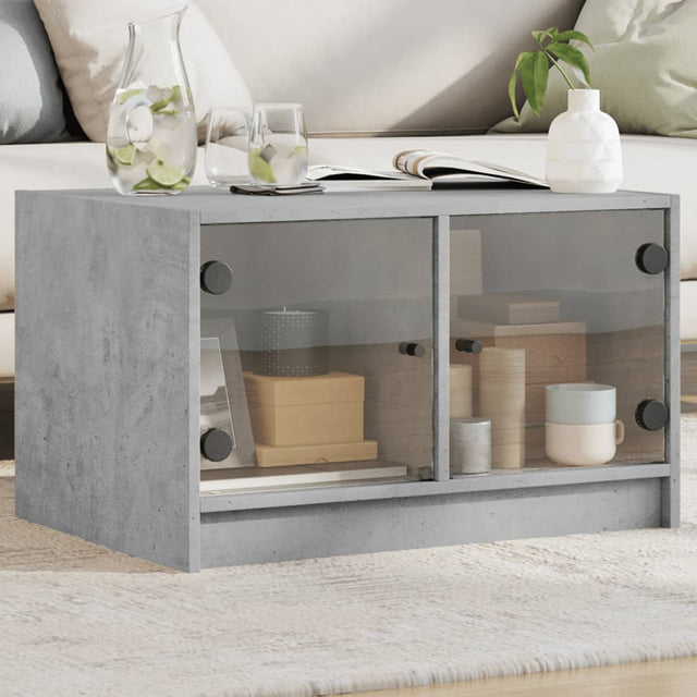 Vidaxl salontafel met glazen deuren 68x50x42 cm betongrijs