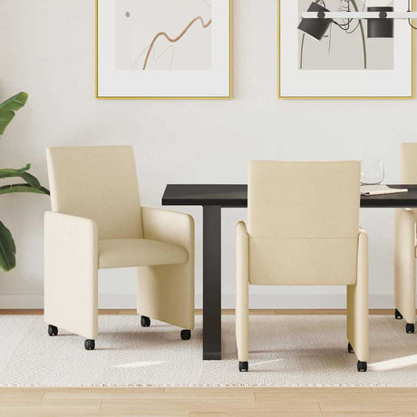 Vidaxl eetkamerstoelen met wieltjes 2 st stof crème 57 x 66 x 94 cm