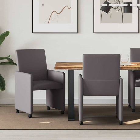 Vidaxl eetkamerstoelen met wieltjes 2 st kunstleer grijs