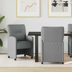 Vidaxl eetkamerstoelen met wieltjes 2 st stof lichtgrijs