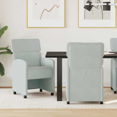 Vidaxl eetkamerstoelen met wieltjes 2 st fluweel lichtgrijs