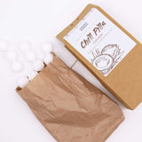 Geschenkbox mit Kokosnuss-Badebomben und Fizz-Chill-Pillen