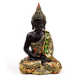Schwarz-orange thailändische Buddha-Kontemplation