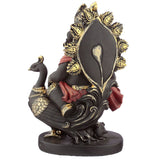 Ganesh-Statue mit Pfeife und Pfauenhahn