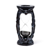 Sanduhr mit Fledermausflügeln