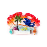 Meeresstrand-Souvenirmagnet, krabbenförmige Muscheln, Delfin