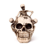 Schädel mit platzenden Skeletten