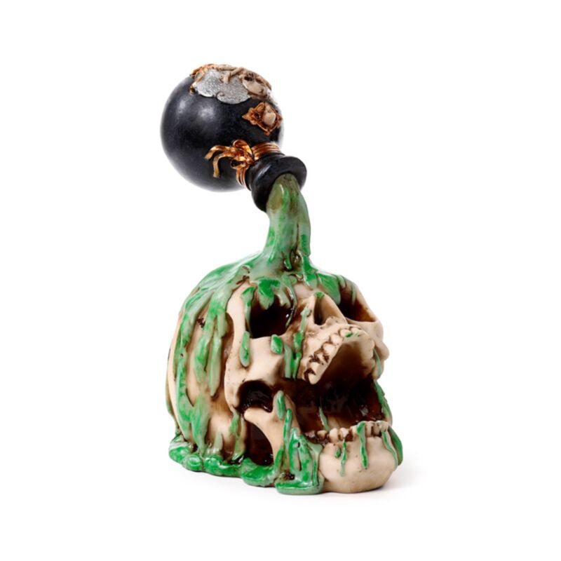 Schreiender Totenkopf mit grünem Getränk