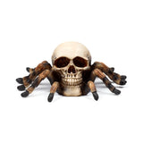 Totenkopf mit Spinnenbeinen