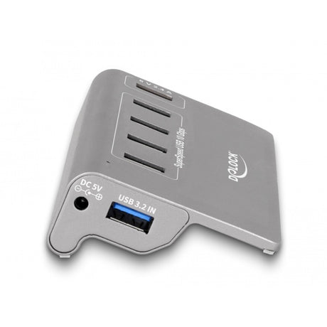 Delock USB-Hub 10 Gbit/s mit 4 USB-A + 1 Schnellladeanschluss (grau, inkl. Netzteil)